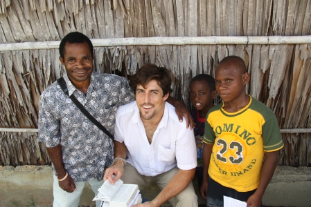 Tyler and friends reading the Bible in Papua